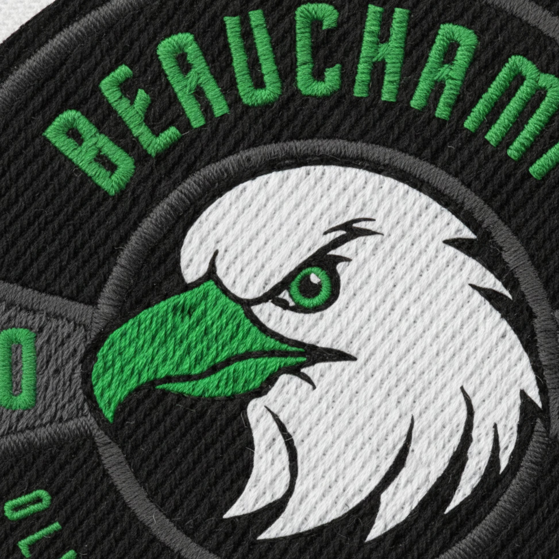 Détail broderie patch Beauchamp Olympique Basket Club