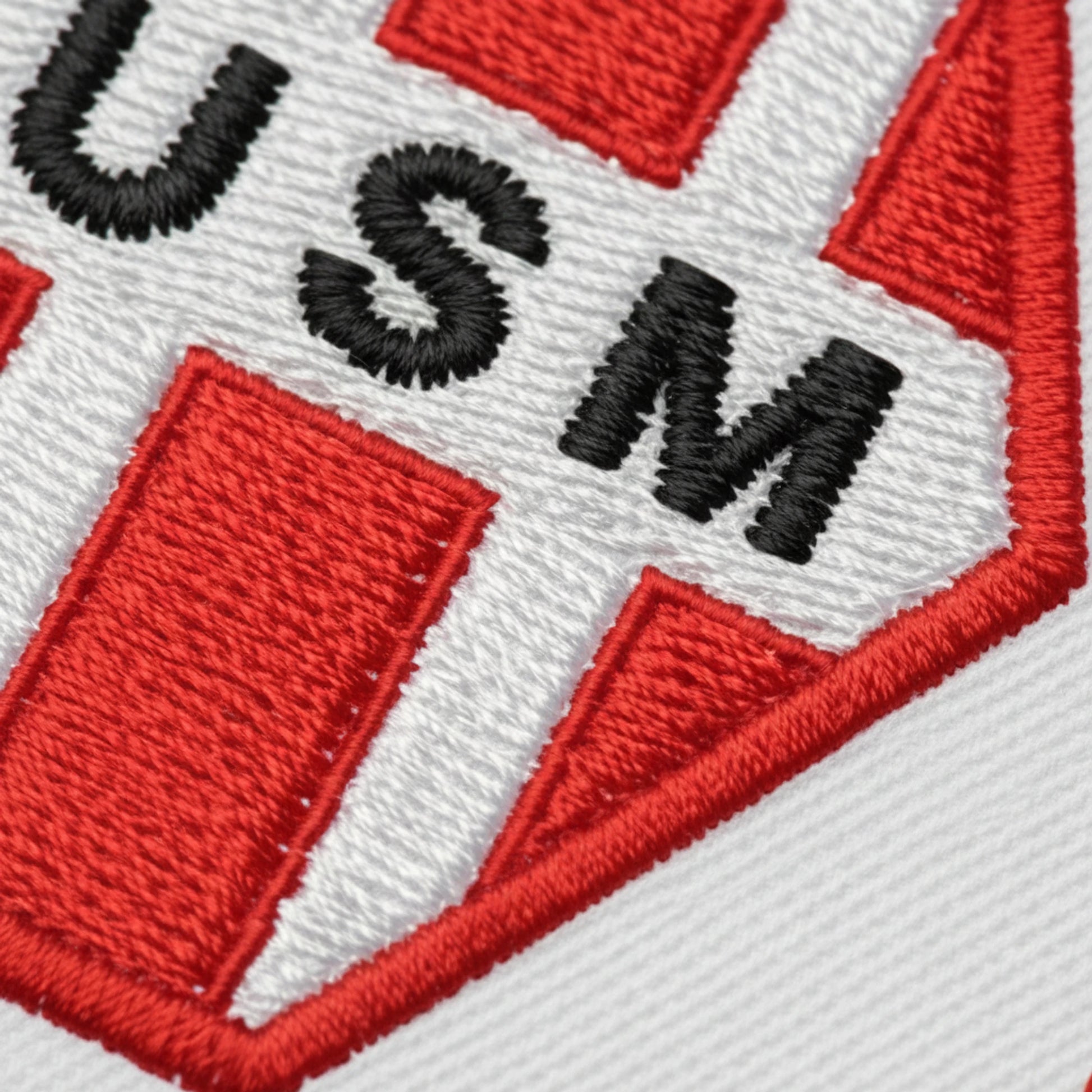 Détail broderie patch Sporting Club Maubeuge