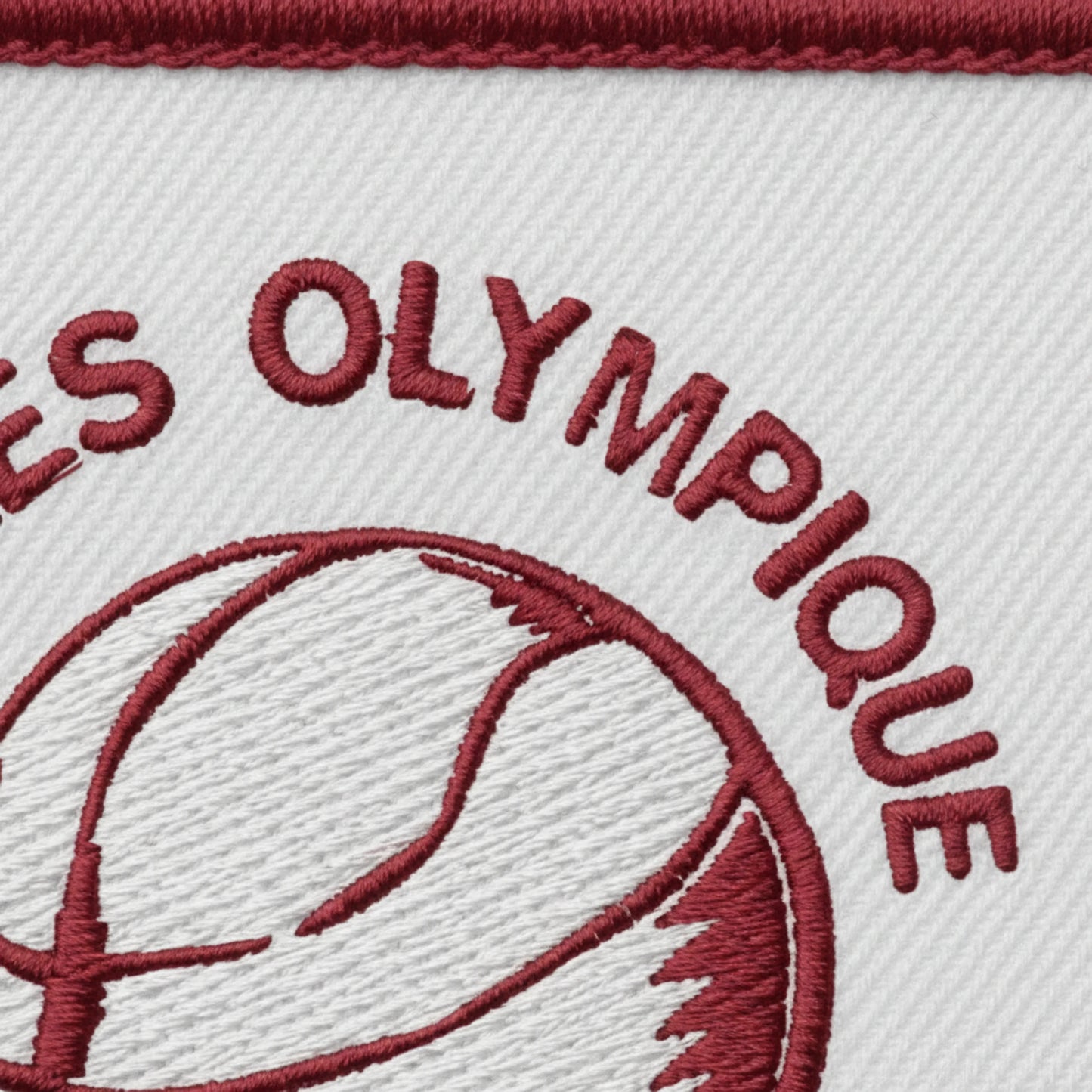 Détail broderie patch Froges Olympique Club Basket