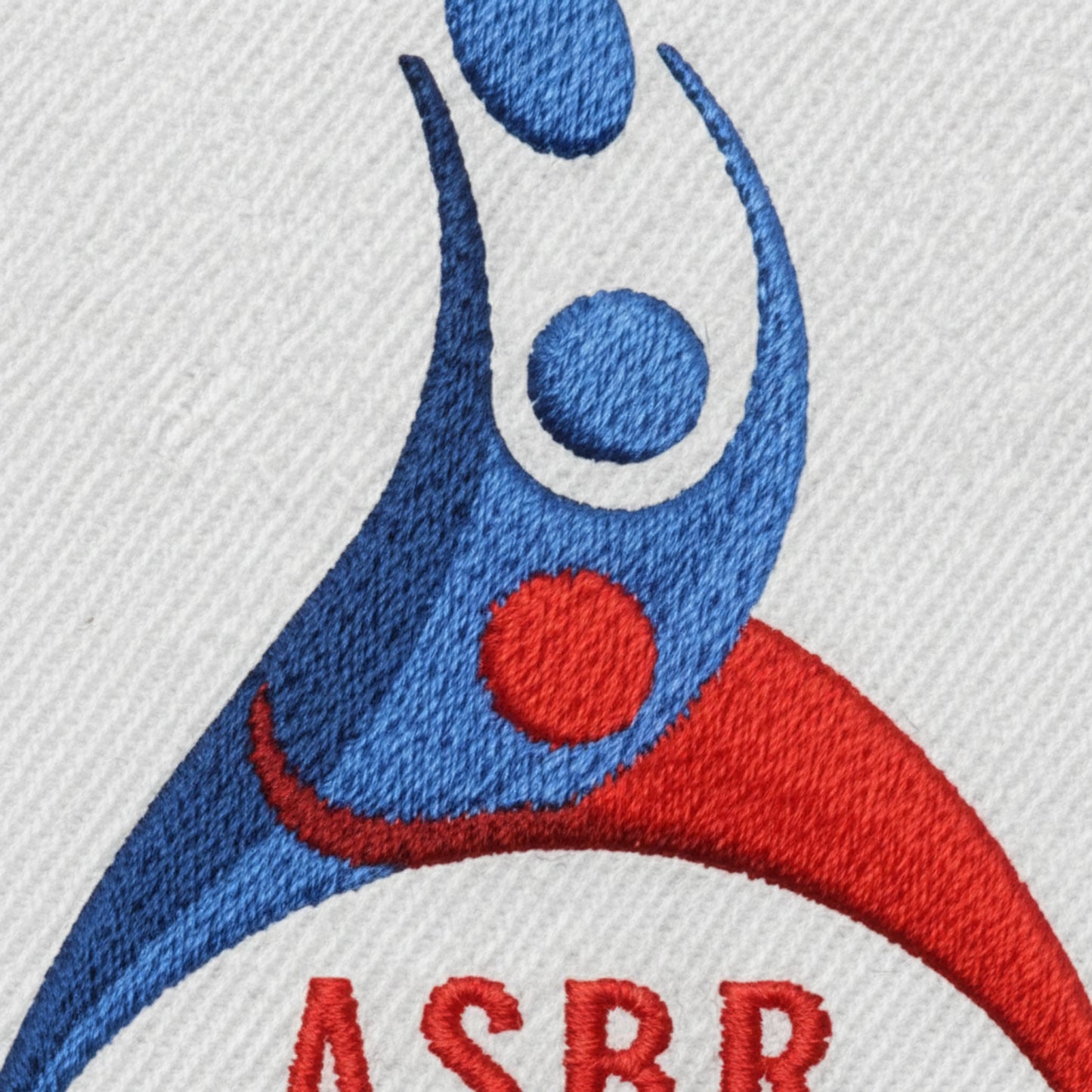 Détail broderie patch Ailes Sportives Bouguenais Rezé