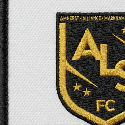 Détail broderie patch AMBERT LIVRADOIS SUD FOOTBALL CLUB
