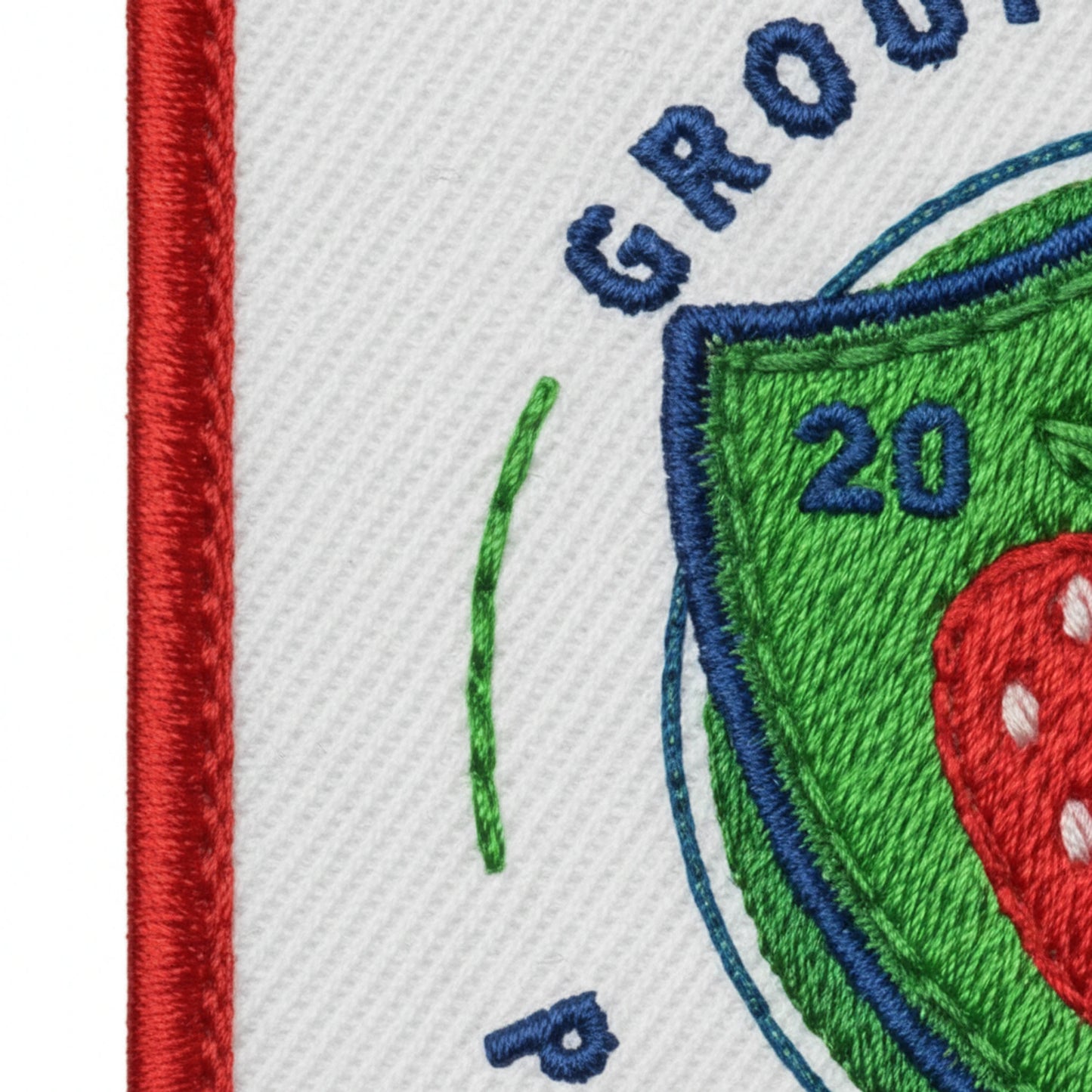 Détail broderie patch GROUPEMENT DU PAYS DE LA FRAISE