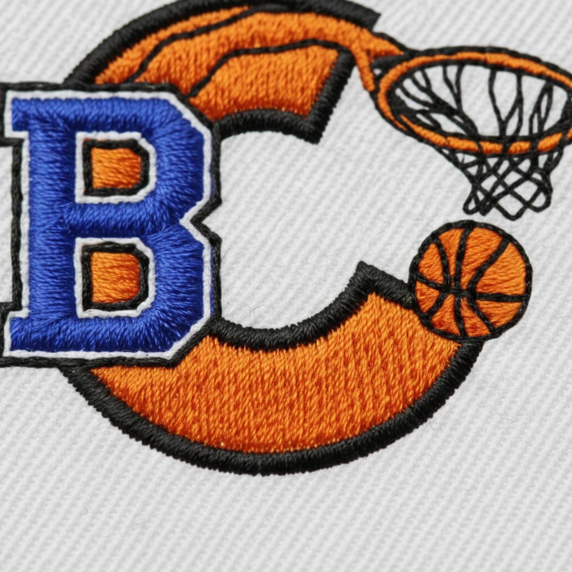 Détail broderie patch Le Neubourg Basket Club