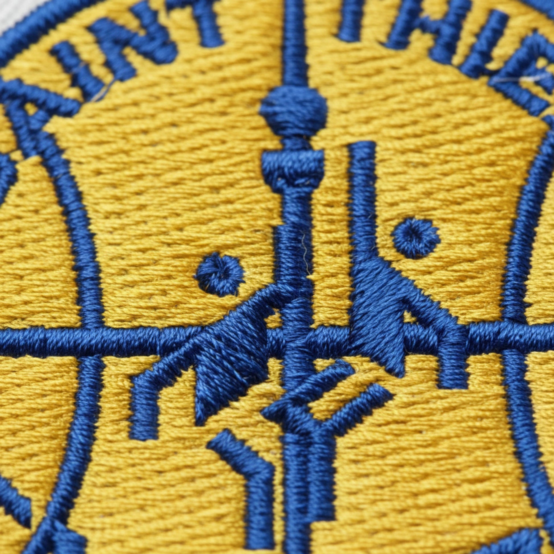 Détail broderie patch SA Thiers Vaillante