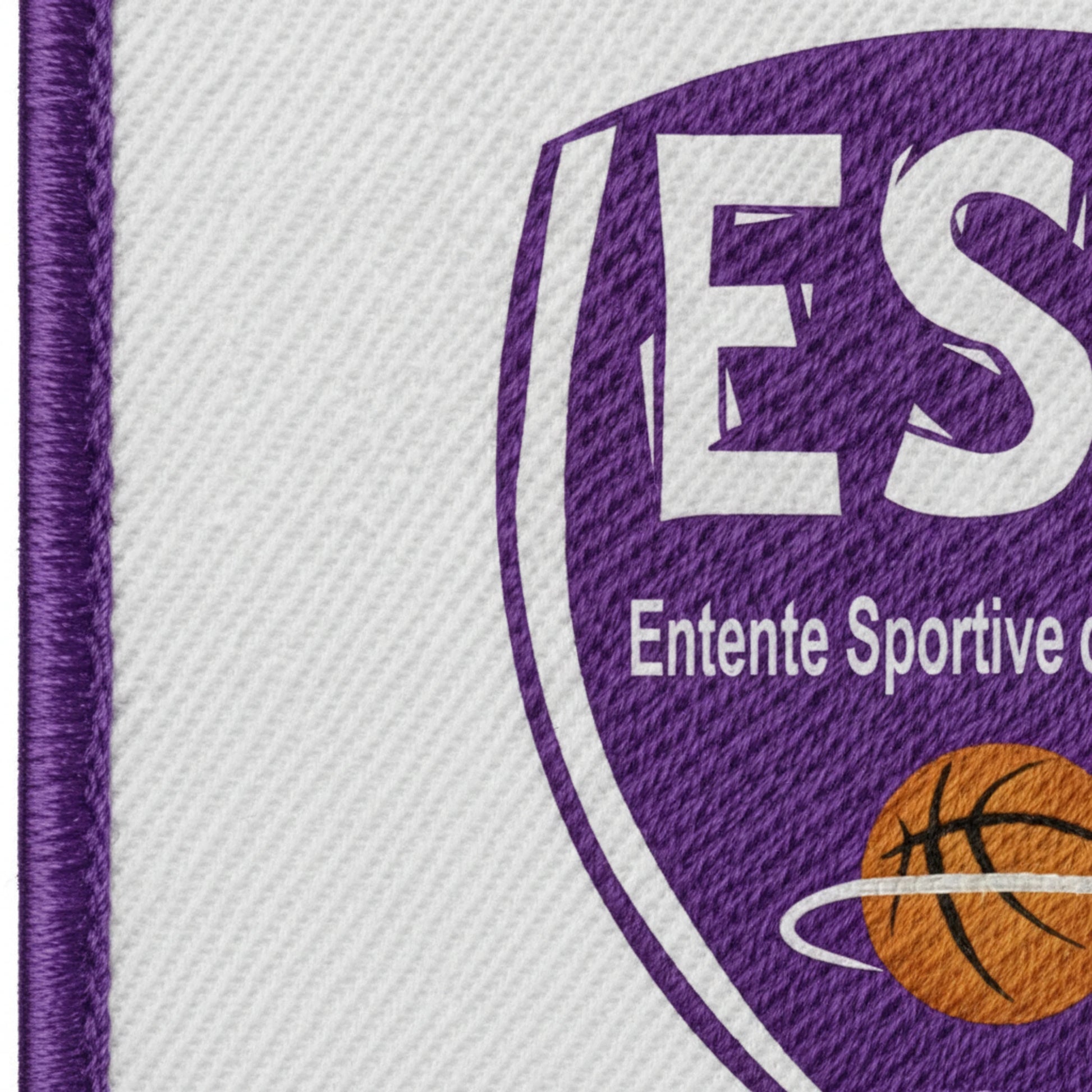 Détail broderie patch ES du Bruilhois Basket